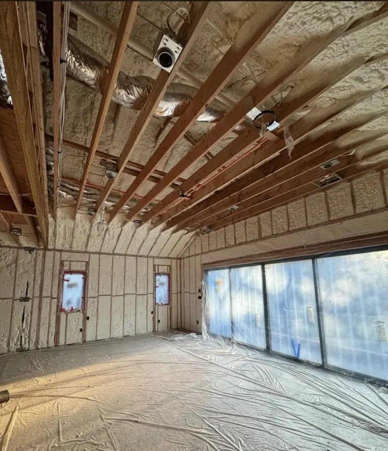 Interior walls and ceiling insulated with spray foam during new construction in Gig Harbor